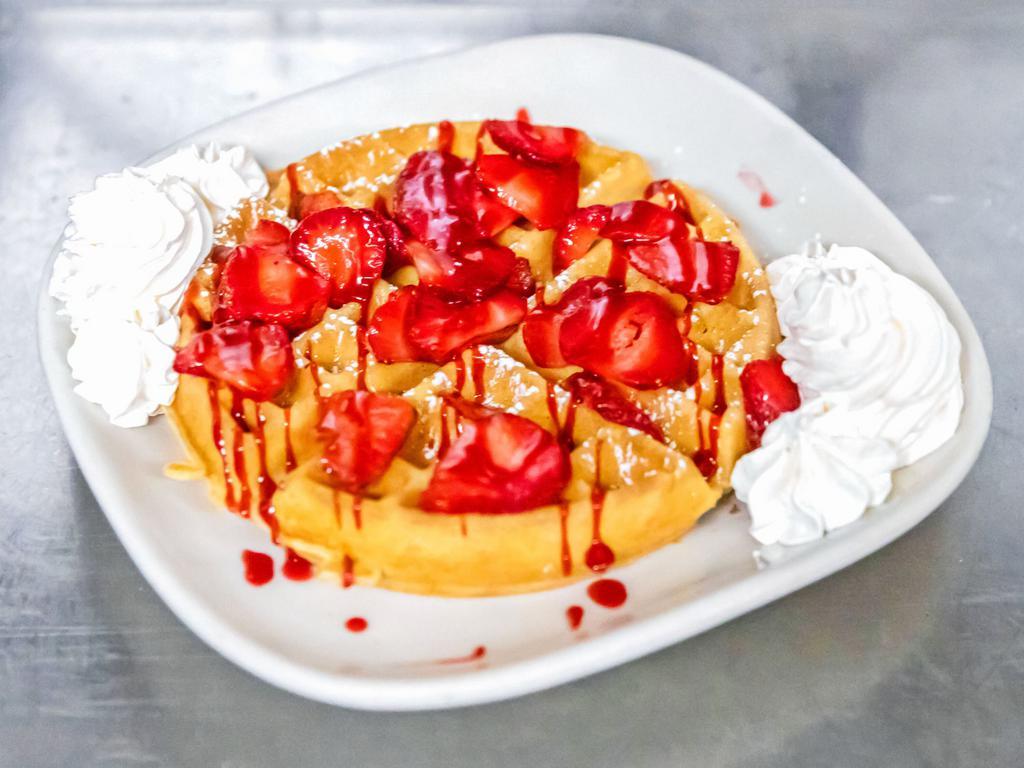 Strawberry Waffle · Fresh strawberries, whipped cream, and powdered sugar.