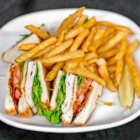 Turkey Bacon Club Sandwiche · Triple decker! House roasted turkey breast, crispy applewood smoked bacon, lettuce and tomat...