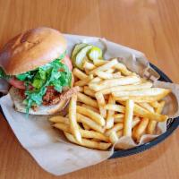 Chicken Tender Sandwich · Lettuce, mayonnaise and tomato on a Vienna bun. Served with chips.