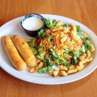 House Salad · Romaine lettuce, broccoli, tomato, onion, red pepper, cheddar cheese, and croutons. Served w...