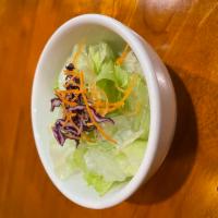 House Green Salad · Fresh salad with a variety of green vegetables typically served on a bed of lettuce. 