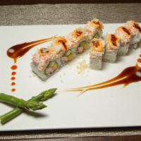 Deep Blue Roll · Tempura crabmeat, mango, avocado with mixed in lobster chunk, shrimp and masago on top.