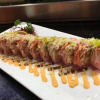 Pink Supreme Roll · Tempera shrimp, spicy shrimp, crunch, cream cheese wrapped in pink soy paper with slice avoc...