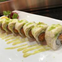 Royal Roll · Spicy tuna, spicy salmon, crunch with slice avocado, seared escolar, green tobiko on top 
