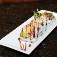 Spider Roll · Deep fried soft shell crab, lettuce and cucumber with eel sauce.