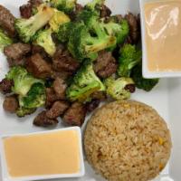Hibachi Steak · Served with steak, plain fried rice, onion, zucchini, broccoli and mushroom.