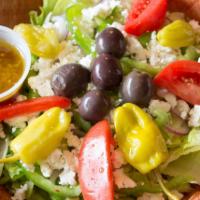 Mediterranean Salad · Iceberg and romaine lettuce blend, tomatoes, red onions, green peppers, pepperoncini peppers...