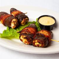 McBride's Jalapeno Poppers · This is not your regular fried Jalapenos. Do you dare try. 4 fresh Jalapeno peppers wrapped ...