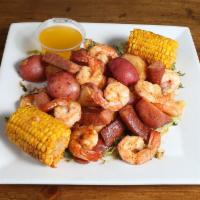 Low Country Boil · Jumbo shrimp, sausage, potatoes and corn on the cob, seasoned with Old Bay, served with butt...