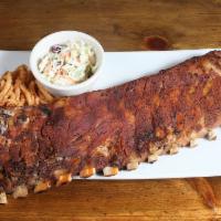 Baby Back BBQ Ribs 1/2 rack · Slow cooked to perfection, homemade BBQ sauce served with tobacco onions and Shoals homemade...