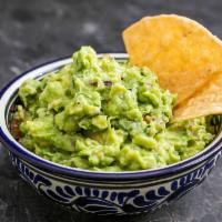 Chips and Guacamole  · 5 oz. House-made guacamole and chips.