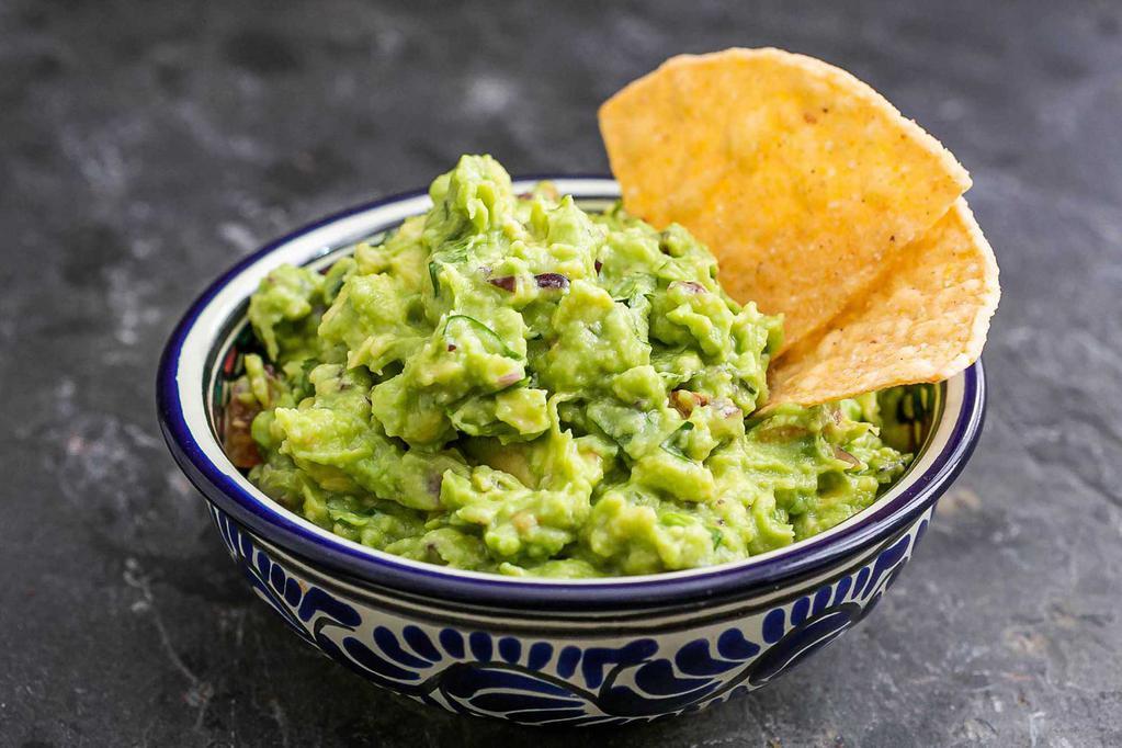 Chips and Guacamole  · 5 oz. House-made guacamole and chips.
