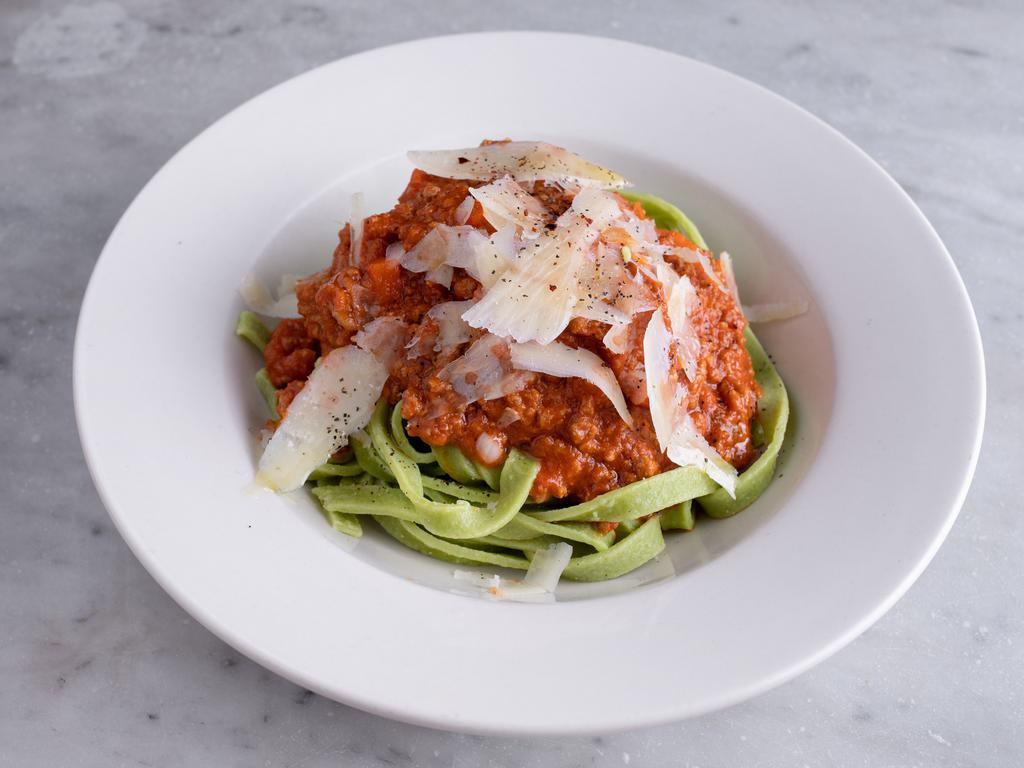 Bolognese · House made Spinach tagliatelle, grass fed beef, veal, and pork ragu, and Parmigiano.