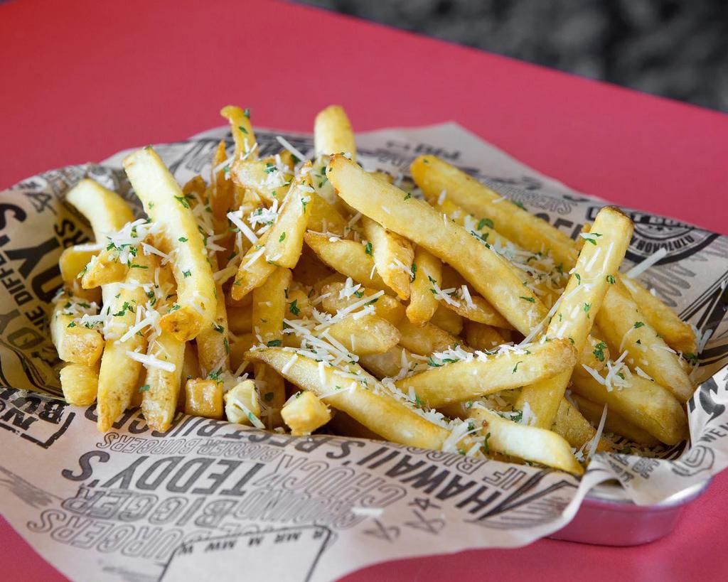 Garlic Butter Fries · A customer favorite! Our crispy fries are toss in garlic butter, made with real garlic bits, then topped with Parmesan and parsley.