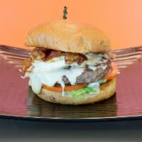 The Knockout Burger · 1/2 lb. all-natural beef burger with mozzarella, bacon, fried egg, basil mayo, lettuce, and ...