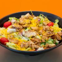 Grilled Chicken Salad · Blend of iceberg and romaine lettuce topped with marinated grilled chicken breast, carrots, ...