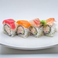 Rainbow Roll  · 8 pieces. Crabmeat, avocado, and cucumber topped with tuna, salmon, snapper, shrimp and avoc...