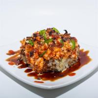 Java Volcano Roll · California roll or scallop, onion, crabmeat, masago, and jalapeno mixed with mayo, baked, an...