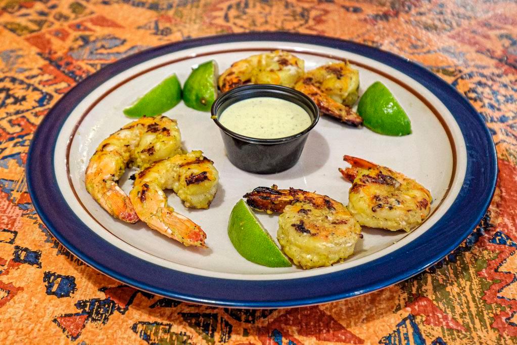 Grilled Shrimp Limon · Jumbo shrimp grilled with our special seasoning and served with la mexicana signature sauce.