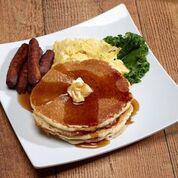 Tak's Special Breakfast · 3 hot cakes, 2 fresh eggs and 4 strips of bacon or sausage links.