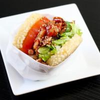 Chicken KoJa · Korean BBQ chicken, sesame vinaigrette lettuce, tomato, cilantro, spicy Gochujang sauce, ses...