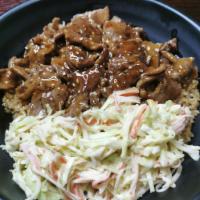Beef teriyaki bowl · Beef Teriyaki on the top, white rice or fried rice on the bottom, crabtmeat cabbage salad , ...