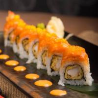 Patriot Roll · Shrimp tempura topped with spicy salmon, yuzu tobiko and spicy mayo.
