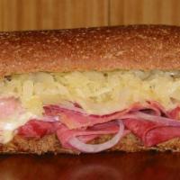 Reuben on Rye · Corned beef, swiss and sauerkraut on rye bread. We recommend our reuben dressing.
