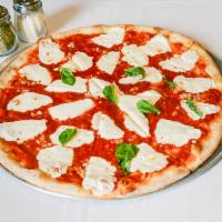 Margherita Pizza · Fresh mozzarella, basil, garlic and plum tomato sauce.