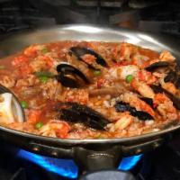 Seafood Jambalaya 		 · Shrimp, scallops, clams, mussels, calamari, crawfish tails, Andouille sausage simmered in Cr...