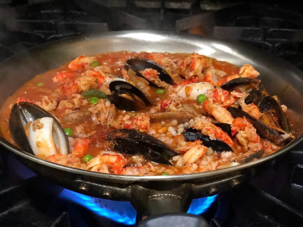 Seafood Jambalaya 		 · Shrimp, scallops, clams, mussels, calamari, crawfish tails, Andouille sausage simmered in Creole tomato sauce with arborio rice.