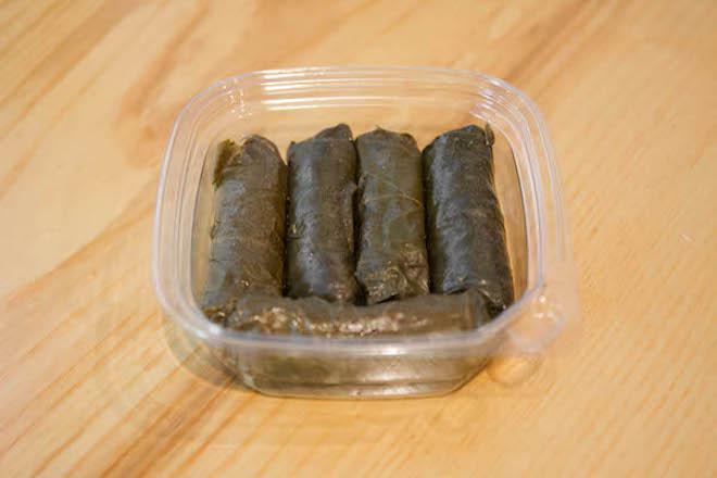 Stuffed Grape Leaves (5) · Grape leaves stuffed with rice,tomatoes, onions, parsley, mint, pomegranate & lemon juice, olive oil and spices