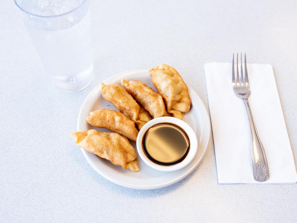 3. Pot Stickers · Dumpling filled with chicken and vegetables.