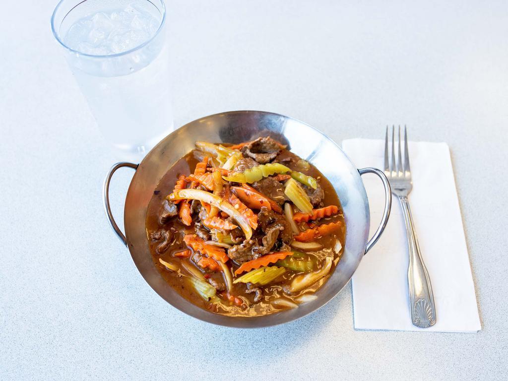 8. Spicy Beef  · Stir fried beef with onions, celery and carrots in spicy sauce. Serve with steamed rice. Spicy.