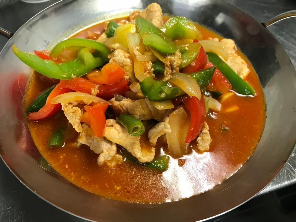 19. Filipino Menudo · Stew. Choice of chicken or pork cooked in tomato sauce with carrots, potatoes, onions, bell peppers and green beans served with steamed rice.