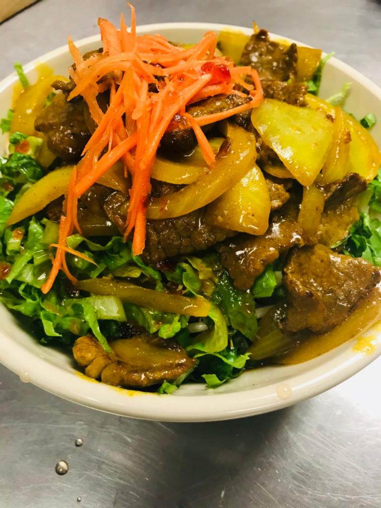 23. Kapoon · Stir fried curry beef served in rice noodles with fresh carrots, lettuce, bean sprouts and crushed peanuts.