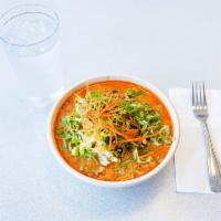 32. Kapoon Soup · Coconut curry noodle soup. Chicken breast and galanga root in red curry, coconut milk, beans...