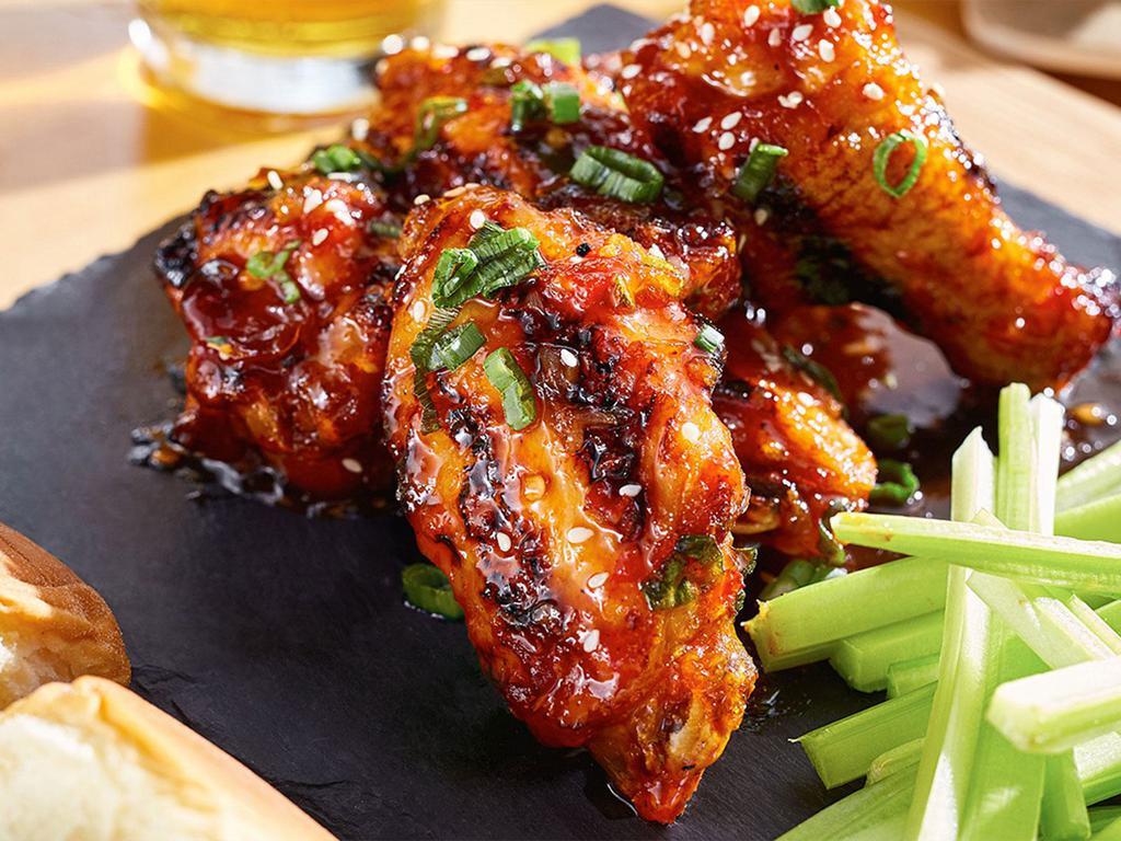 Buffalo Wings · Buffalo style, celery and dipping sauces.