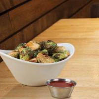 Sweet Sriracha Brussels Sprouts · Fried Brussels sprouts tossed in a sweet Sriracha sauce.