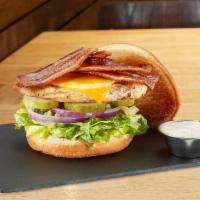 Chicken Bacon Ranch · Served with grilled chicken breast, bacon, cheddar, lettuce blend, red onions, pickles, and ...