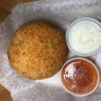 Buffalo Chicken Rice Ball · Rice, mild buffalo chicken and mozzarella breaded and fried served with buffalo sauce and a ...