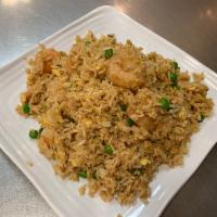 Shrimp Fried Rice · Steamed rice stir fried with eggs, peas, carrots and green onions.