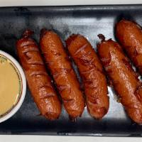 Berkshire Sausages · Japanese Sausage and Mustard Sauce.