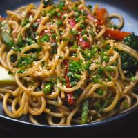 Stir Fry Udon Noodles · Mixed vegetables and sesame soy sauce.
