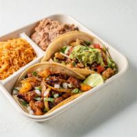 2 Taco Plate · A classic. Two corn or flour tortillas filled with choice of protein, toppings style and sal...