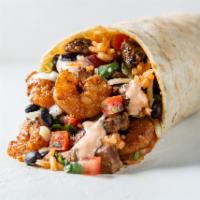 Surf and Turf Burrito · 13” flour tortilla stuffed with marinated, grilled steak, shrimp, beans, rice, choice of top...
