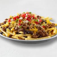 Chronic Fries · Crispy french fries topped with choice of protein, cheese, onions, cilantro, lime and choice...