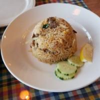 24. Kao Pad Dinner · Stir fried jasmine rice with onion, green onion, tomato, egg and garlic.
