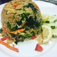 V15. Kao Pad Kapau Jay · Vegan basil fried rice. Variety vegetable or tofu stir fried jasmine rice with onion, basil,...