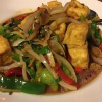 V17. Pad Kapau Tofu Dinner · Crispy tofu stir fried with basil, red and green bell pepper, onion, chili and garlic. Mediu...